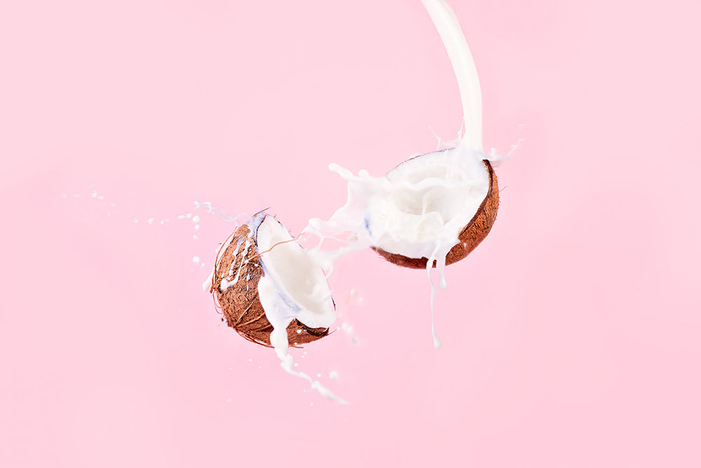 Sulfate Free Shampoo, made with natural, botanical coconut extracts. Image of coconut - Key ingredient 